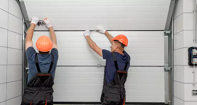 Garage Door Bottom Panel Repair in Seminole, FL